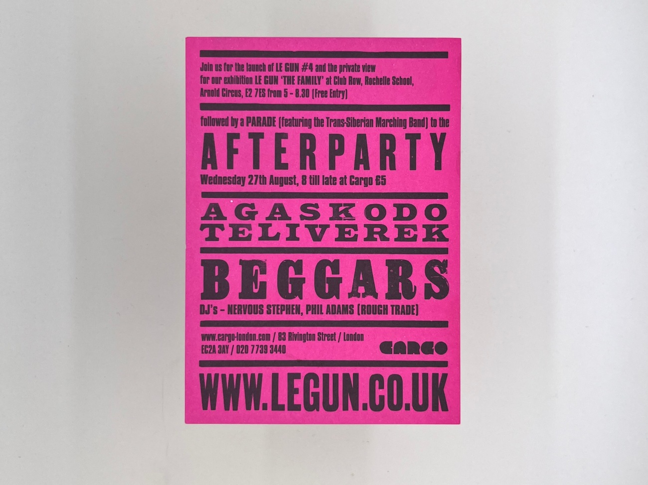 The back side of a bright pink almost magenta postcard with blank ink printing giving details about the Afterparty at Cargo for £5 entry. www.legun.co.uk