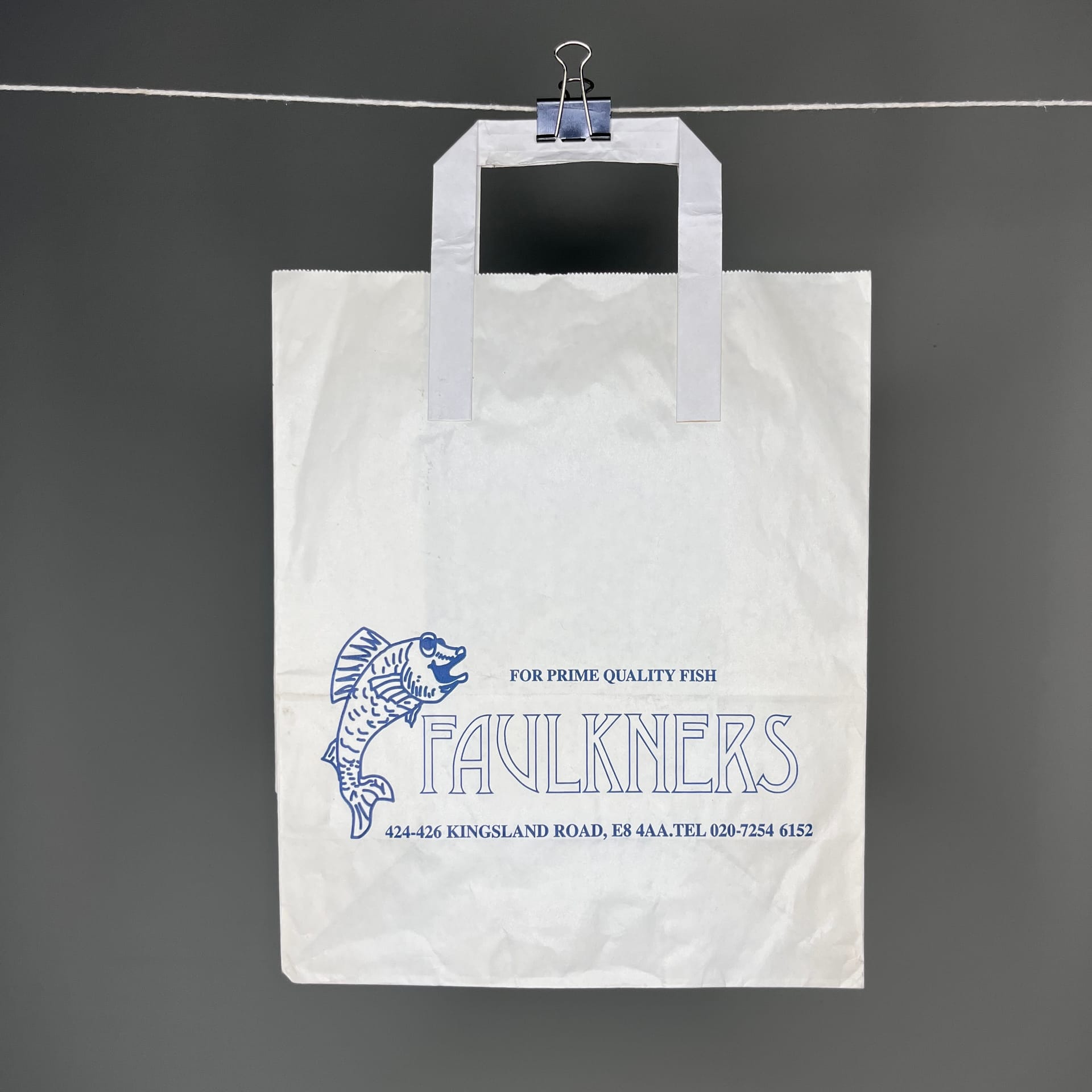 Faulkners fish and chips bag